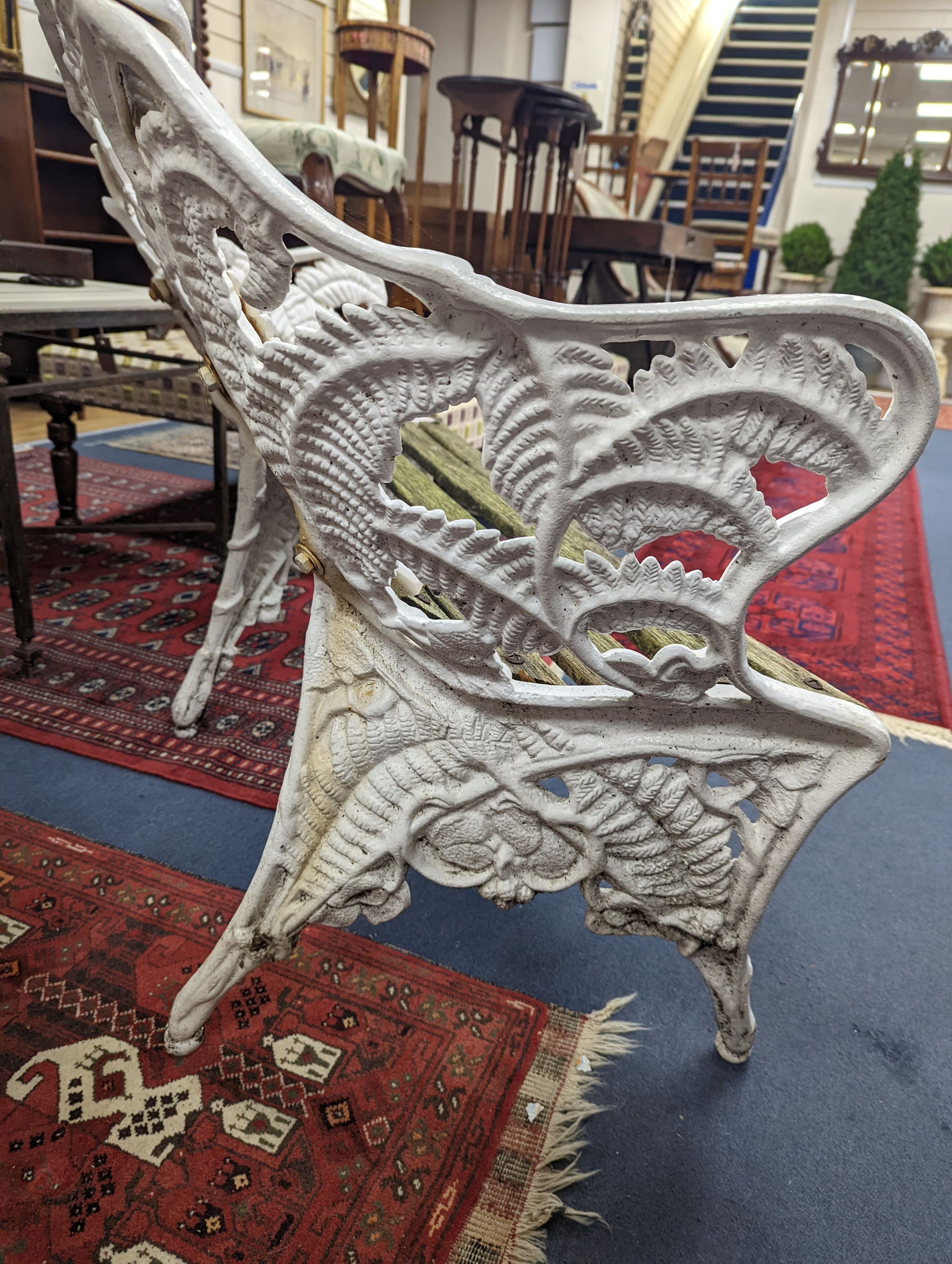 A Victorian Coalbrookdale design painted cast iron fern pattern garden bench, length 114cm, depth 44cm, height 90cm